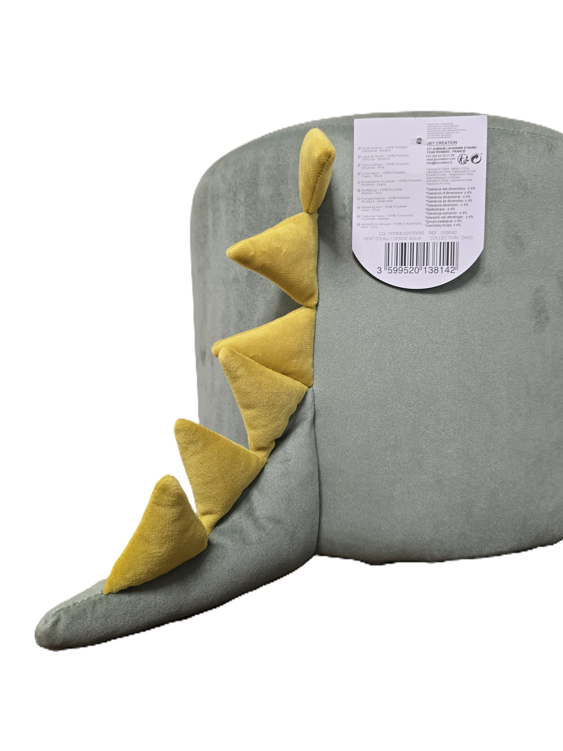 Détail de la queue de dinosaure avec crêtes fantaisie sur un petit tabouret d'appoint vert d'eau pour chambre d'enfant.