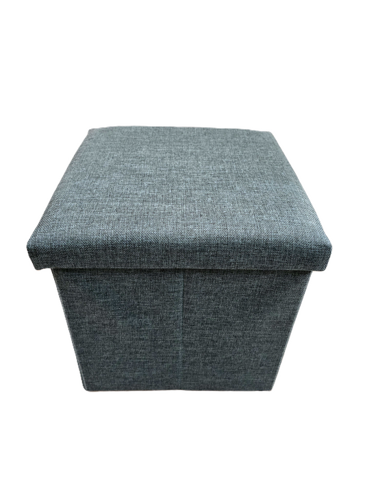 Pouf rectangulaire coffre de rangement pliable, tissu coloris pétrole chiné avec couvercle rembourré servant d'assise.